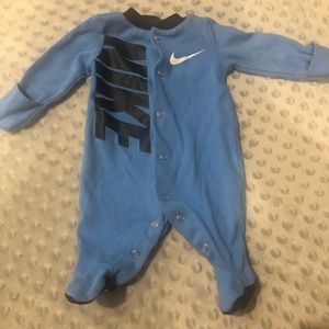 Two New born Nike long sleeve body suits